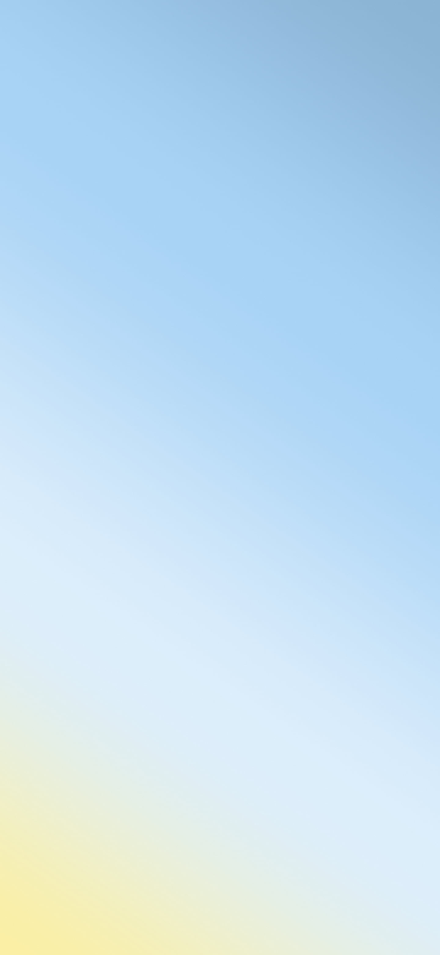 Light Blue and Pastel Yellow Diagonal Ombre Gradient wallpaper for iPhone and Android